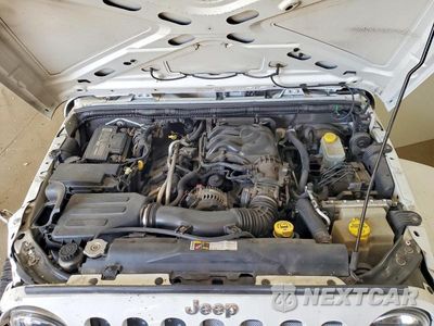 Zdjęcie 11 z 13 samochodu: 2013 JEEP WRANGLER UNLIMITED SAHARA VIN:1C4BJWEG7DL539069 - miniatura