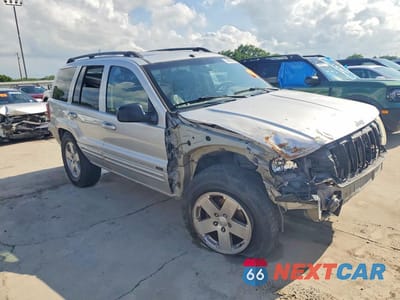 Czwarte zdjęcie samochodu z boku: 2004 JEEP GRAND CHEROKEE LIMITED VIN:1J4GW58J14C265290 - miniatura