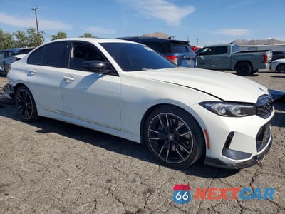 Czwarte zdjęcie samochodu z boku: 2023 BMW M340I VIN:3MW49FS07P8C98017 - miniatura