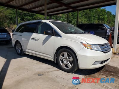Czwarte zdjęcie samochodu z boku: 2013 HONDA ODYSSEY TOURING VIN:5FNRL5H90DB008959 - miniatura