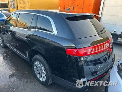 Trzecie zdjęcie samochodu z tyłu: 2018 LINCOLN MKT VIN:2LMHJ5NK0JBL00114 - miniatura