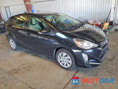 Czwarte zdjęcie samochodu z boku: 2015 TOYOTA PRIUS C ONE VIN:JTDKDTB36F1113654 - miniatura