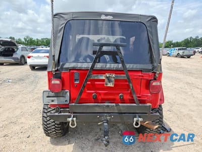 Zdjęcie 6 z 11 samochodu: 1999 JEEP WRANGLER / TJ SPORT VIN:1J4FY19S5XP482585 - miniatura