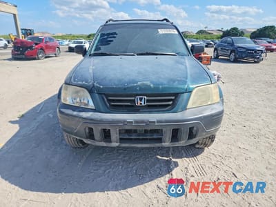 Piąte zdjęcie samochodu w środku: 1999 HONDA CR-V LX VIN:JHLRD2842XC008241 - miniatura