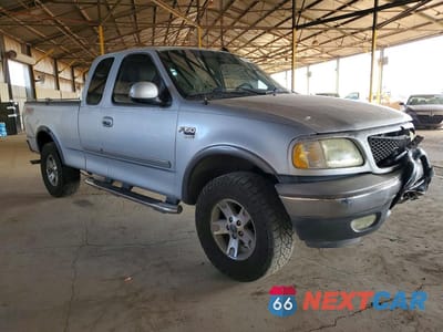 Czwarte zdjęcie samochodu z boku: 2003 FORD F150 VIN:1FTRX18L63NA20428 - miniatura