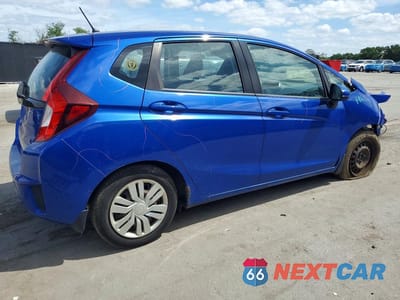 Trzecie zdjęcie samochodu z tyłu: 2015 HONDA FIT LX VIN:3HGGK5H59FM722404 - miniatura
