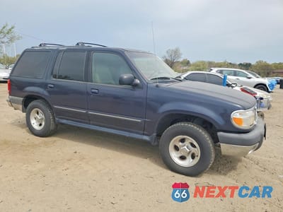 Czwarte zdjęcie samochodu z boku: 1999 FORD EXPLORER VIN:1FMZU34E9XUC26779 - miniatura