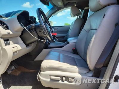 Zdjęcie 7 z 13 samochodu: 2013 HONDA PILOT TOURING VIN:5FNYF4H98DB035808 - miniatura