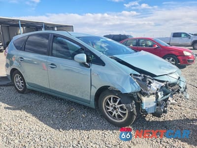 Czwarte zdjęcie samochodu z boku: 2016 TOYOTA PRIUS V TWO VIN:JTDZN3EU8GJ054706 - miniatura