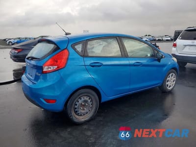 Trzecie zdjęcie samochodu z tyłu: 2013 FORD FIESTA SE VIN:3FADP4EJ1DM150147 - miniatura