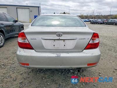 Zdjęcie 6 z 11 samochodu: 2003 TOYOTA CAMRY LE VIN:4T1BE32K63U669070 - miniatura