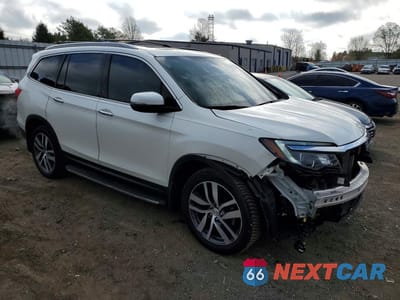Czwarte zdjęcie samochodu z boku: 2018 HONDA PILOT ELITE VIN:5FNYF6H0XJB003385 - miniatura