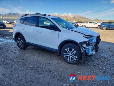 Czwarte zdjęcie samochodu z boku: 2017 TOYOTA RAV4 LE VIN:2T3BFREV0HW570815 - miniatura