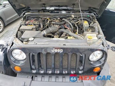 Zdjęcie 11 z 12 samochodu: 2007 JEEP WRANGLER SAHARA VIN:1J4FA54137L132308 - miniatura