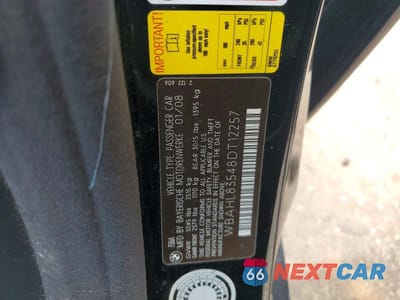 Zdjęcie 12 z 12 samochodu: 2008 BMW 750 I VIN:WBAHL83548DT12257 - miniatura