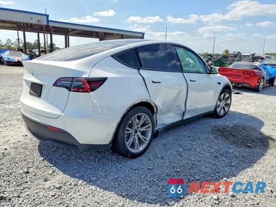 Trzecie zdjęcie samochodu z tyłu: 2021 TESLA MODEL Y VIN:5YJYGDED9MF103409 - miniatura