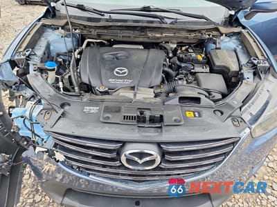 Zdjęcie 12 z 13 samochodu: 2016 MAZDA CX-5 GT VIN:JM3KE4DY5G0822909 - miniatura