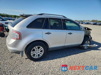 Trzecie zdjęcie samochodu z tyłu: 2010 FORD EDGE SE VIN:2FMDK3GC7ABB79887 - miniatura