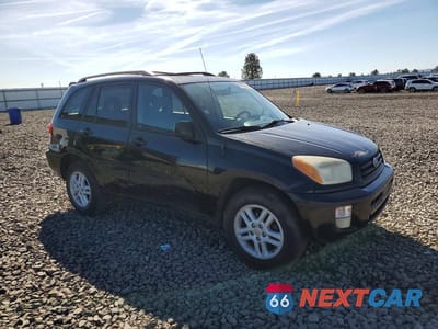 Czwarte zdjęcie samochodu z boku: 2002 TOYOTA RAV4 BASE VIN:JTEGH20V926003909 - miniatura