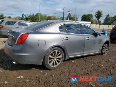 Trzecie zdjęcie samochodu z tyłu: 2012 LINCOLN MKS VIN:1LNHL9FT0CG807237 - miniatura