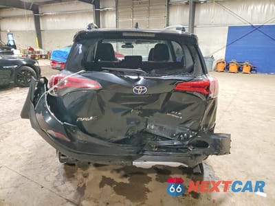 Zdjęcie 6 z 13 samochodu: 2018 TOYOTA RAV4 HYBRID XLE VIN:JTMRJREV5JD193284 - miniatura