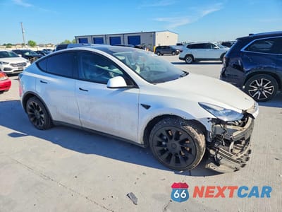 Czwarte zdjęcie samochodu z boku: 2022 TESLA MODEL Y VIN:7SAYGDEEXNF422959 - miniatura