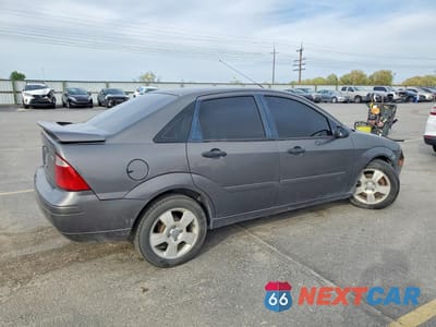 Trzecie zdjęcie samochodu z tyłu: 2006 FORD FOCUS ZX4 VIN:1FAFP34N16W126733 - miniatura
