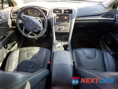 Zdjęcie 8 z 13 samochodu: 2018 FORD FUSION TITANIUM VIN:3FA6P0RU7JR140999 - miniatura