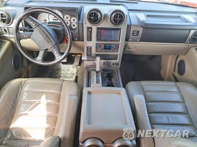 Zdjęcie 8 z 13 samochodu: 2003 HUMMER H2 VIN:5GRGN23U73H118853 - miniatura