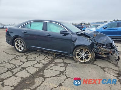 Czwarte zdjęcie samochodu z boku: 2014 FORD TAURUS SEL VIN:1FAHP2H89EG131887 - miniatura