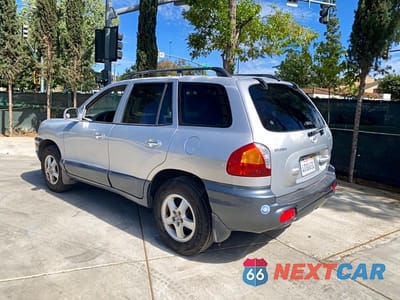 Trzecie zdjęcie samochodu z tyłu: 2001 HYUNDAI SANTA FE GL VIN:KM8SC83D01U126863 - miniatura