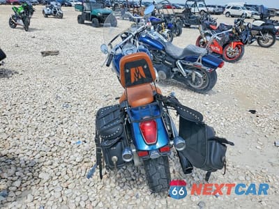 Czwarte zdjęcie samochodu z boku: 2004 HONDA VTX1300 C VIN:1HFSC55054A002211 - miniatura