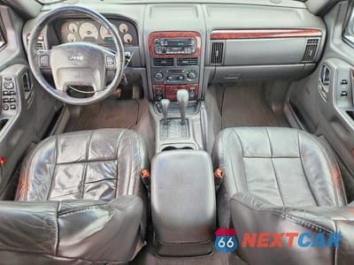 Zdjęcie 8 z 13 samochodu: 2001 JEEP GRAND CHEROKEE LIMITED VIN:1J4GW58SX1C578326 - miniatura