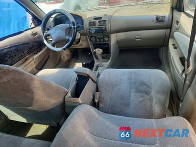 Zdjęcie 8 z 12 samochodu: 2001 TOYOTA COROLLA LE VIN:1NXBR12E51Z492401 - miniatura