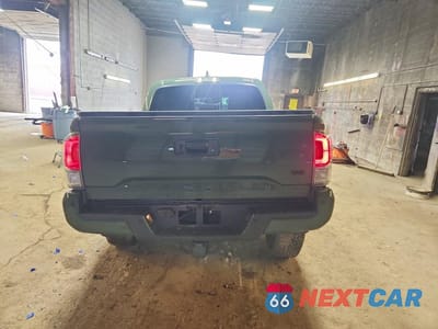 Zdjęcie 6 z 12 samochodu: 2021 TOYOTA TACOMA TRD OFF-ROAD VIN:3TYCZ5AN8MT049044 - miniatura