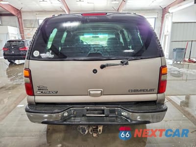 Zdjęcie 6 z 12 samochodu: 2001 CHEVROLET TAHOE K1500 VIN:1GNEK13T21J142543 - miniatura