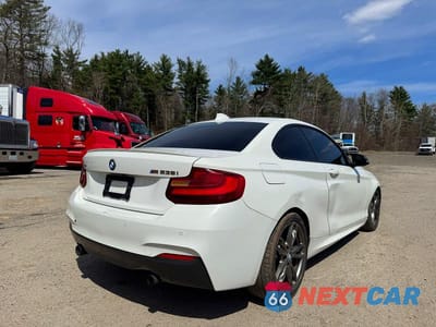 Czwarte zdjęcie samochodu z boku: 2016 BMW M235XI VIN:WBA1J9C53GV372181 - miniatura