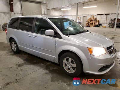 Czwarte zdjęcie samochodu z boku: 2012 DODGE GRAND CARAVAN SXT VIN:2C4RDGCG3CR114341 - miniatura