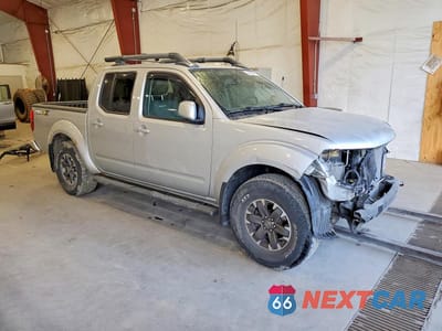 Czwarte zdjęcie samochodu z boku: 2016 NISSAN FRONTIER PRO-4X VIN:1N6AD0EV2GN767114 - miniatura