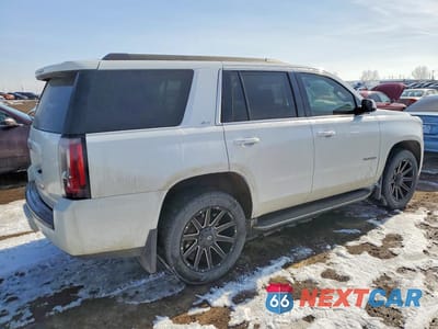Trzecie zdjęcie samochodu z tyłu: 2015 GMC YUKON SLT VIN:1GKS2BKC9FR108759 - miniatura