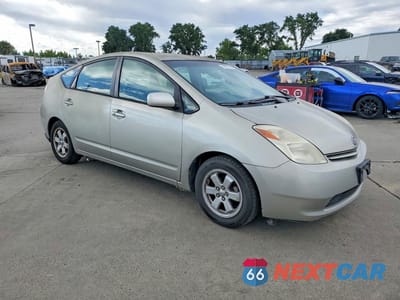 Czwarte zdjęcie samochodu z boku: 2004 TOYOTA PRIUS BASE VIN:JTDKB20U840094507 - miniatura