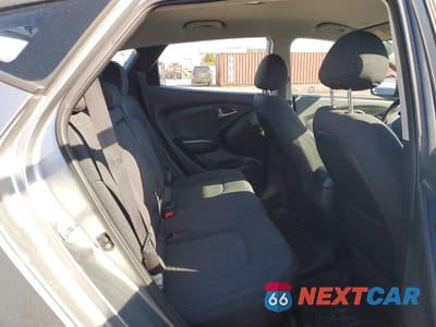 Zdjęcie 11 z 13 samochodu: 2010 HYUNDAI TUCSON GLS VIN:KM8JT3AC0AU018817 - miniatura