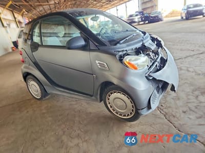 Czwarte zdjęcie samochodu z boku: 2013 SMART FORTWO PURE VIN:WMEEJ3BA1DK664409 - miniatura