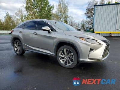 Czwarte zdjęcie samochodu z boku: 2017 LEXUS RX 450H BASE VIN:2T2BGMCA1HC010243 - miniatura