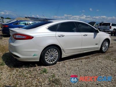 Trzecie zdjęcie samochodu z tyłu: 2014 FORD FUSION TITANIUM PHEV VIN:3FA6P0SU1ER356802 - miniatura