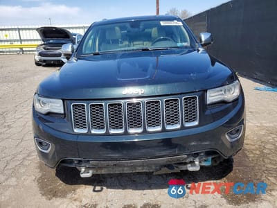Piąte zdjęcie samochodu w środku: 2014 JEEP GRAND CHEROKEE OVERLAND VIN:1C4RJFCG1EC178859 - miniatura