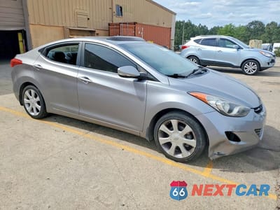 Czwarte zdjęcie samochodu z boku: 2013 HYUNDAI ELANTRA LIMITED VIN:KMHDH4AEXDU522673 - miniatura