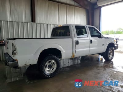 Trzecie zdjęcie samochodu z tyłu: 2015 FORD F250 SUPER DUTY VIN:1FT7W2BT2FEA77349 - miniatura