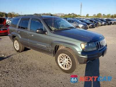 Czwarte zdjęcie samochodu z boku: 2002 JEEP GRAND CHEROKEE LIMITED VIN:1J4GW58N22C281353 - miniatura