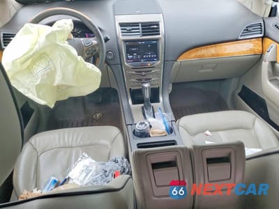 Zdjęcie 8 z 13 samochodu: 2013 LINCOLN MKX VIN:2LMDJ8JK6DBL14382 - miniatura